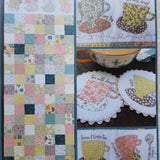 Tea time table runner and mug rugs.