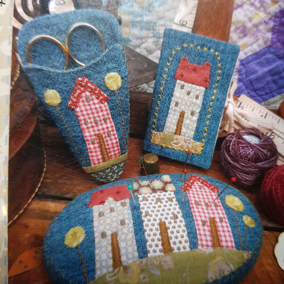 Village sewing trio in fabric